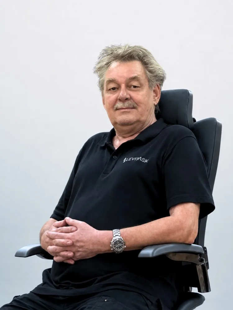 Klaus Kummer seated in a Vision Chair in 2026